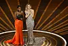 HOLLYWOOD, CALIFORNIA - MARCH 12: (L-R) Janelle Monáe and Kate Hudson speak onstage during the 95th Annual Academy Awards at Dolby Theatre on March 12, 2023 in Hollywood, California. (Photo by Kevin Winter/Getty Images)