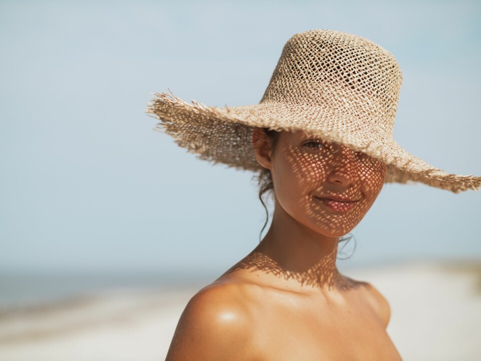 Beach Woman in Sun Hat on Vacation