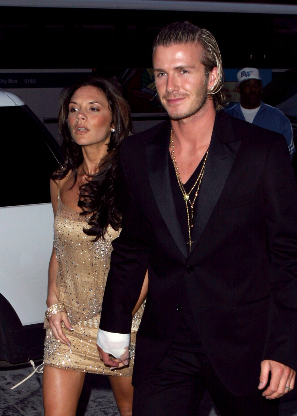 Victoria Beckham og David Beckham med langt hår